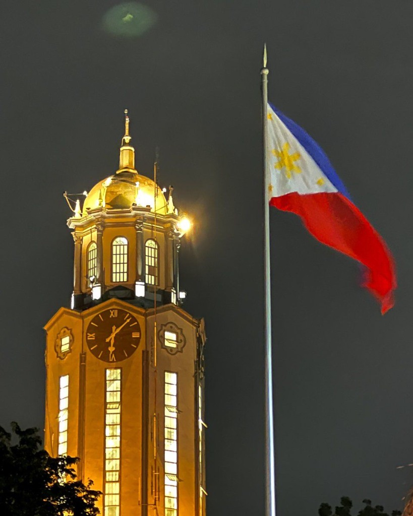 Manila City Hall Clock Tower with Philippine Flag